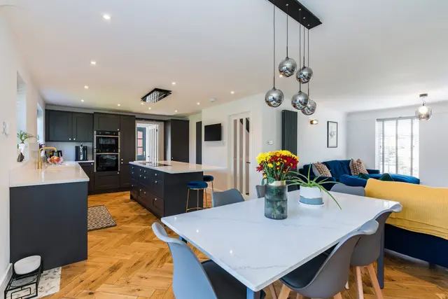 Open-plan renovated kitchen, dining and living space